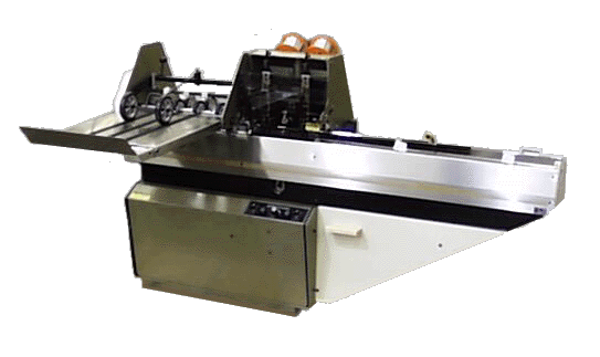 Official Rosback factory photo of the 201B saddle stitcher — feed table, twin stitching heads, tape delivery.