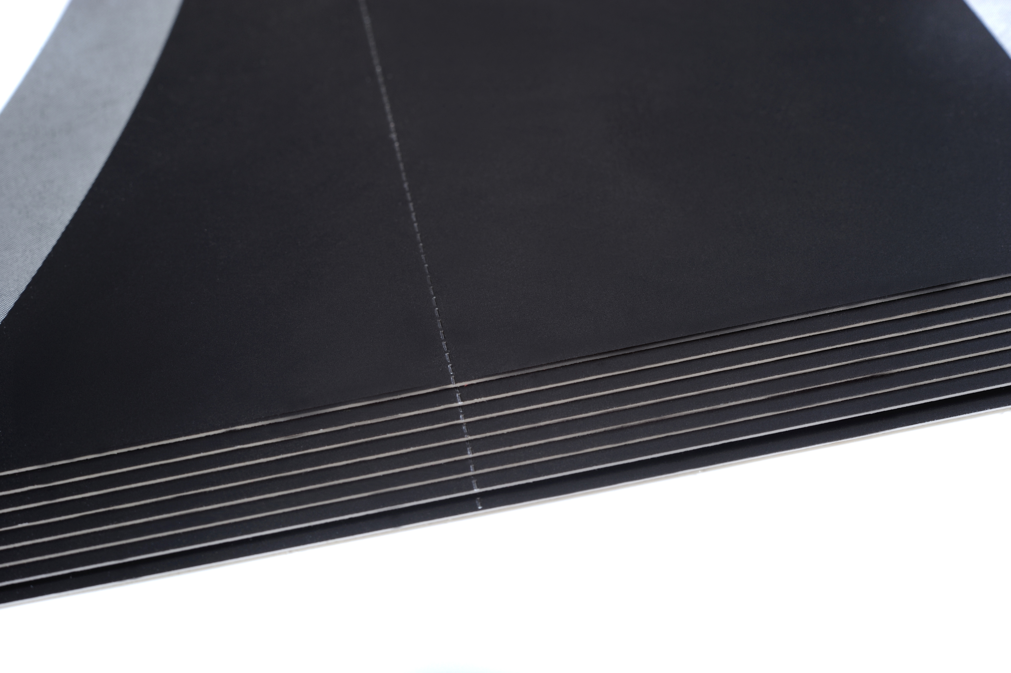 Near-invisible, flat to the sheet