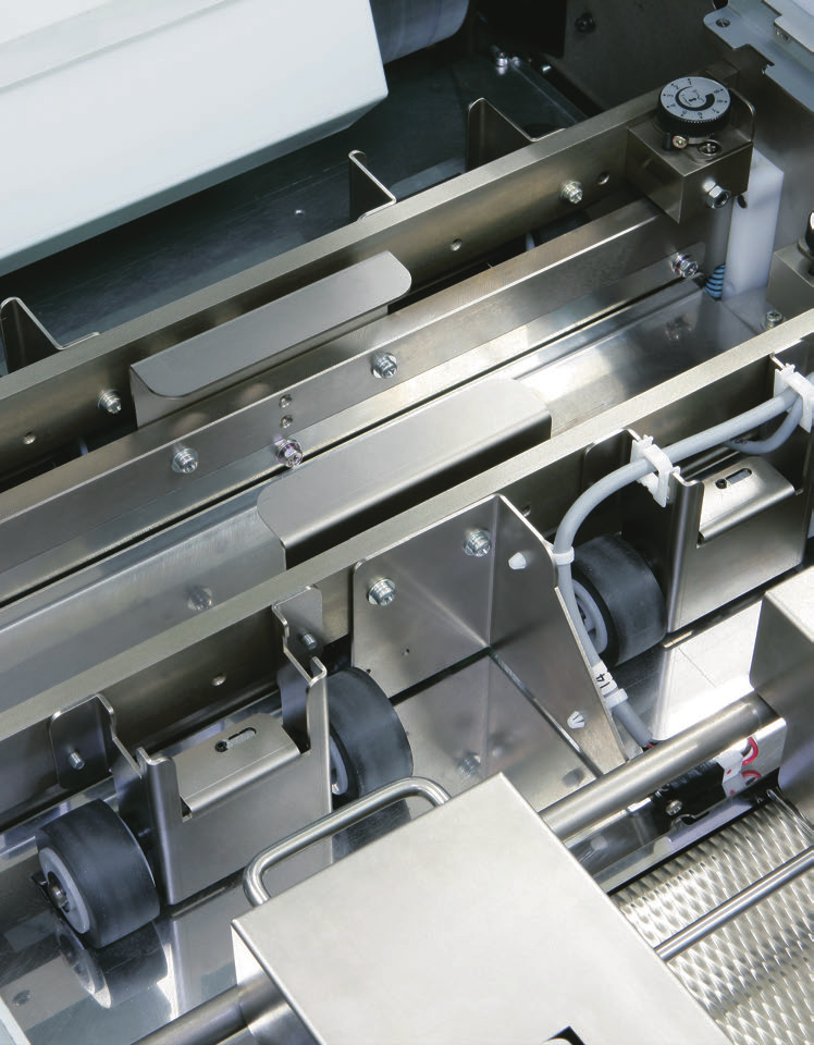 Horizon CRF-362 creaser and folder transport mechanism detail — official brochure photo