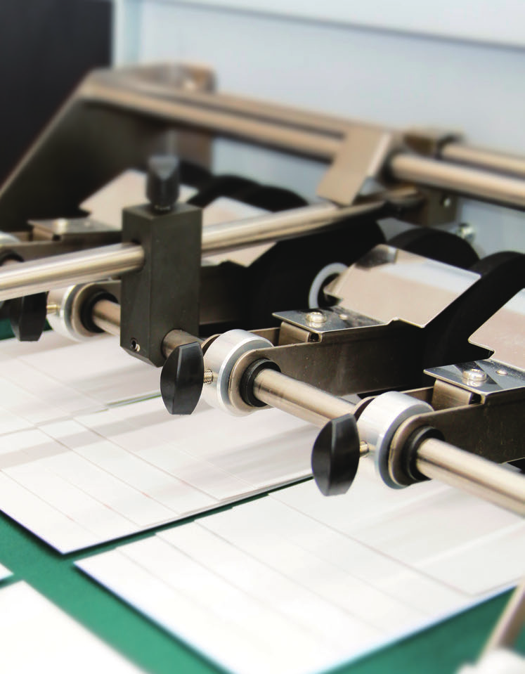 Horizon SmartSlitter rotary slitter, creaser and perforator tooling detail — official brochure photo