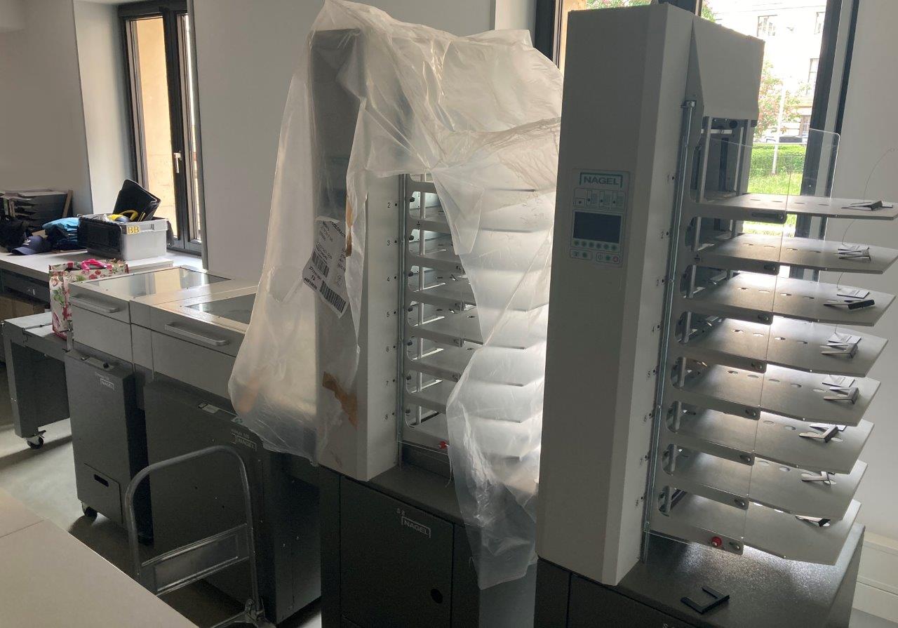 Nagel S8 suction collator tower, 8 bins — dealer photo