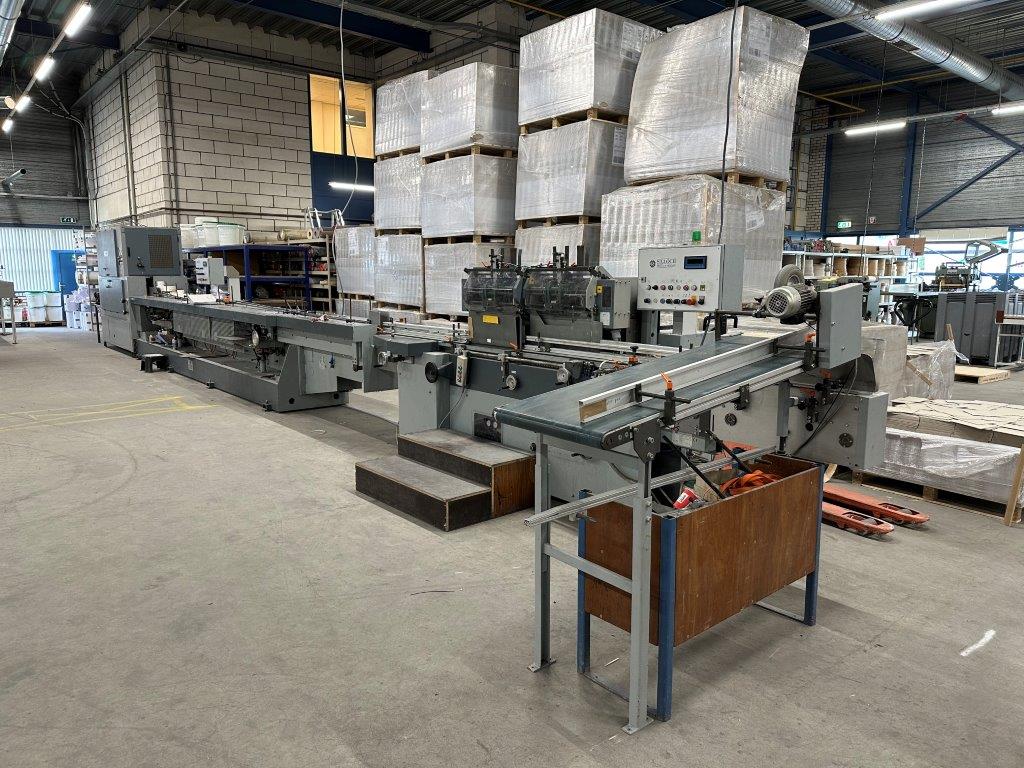 Sigloch SB 6000 book-back gluing and lining line, SIGLOCH nameplate on cabinet — dealer photo