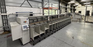 Theisen & Bonitz tb flex B 316 SP automated belt-transport collating line — dealer photo (PressCity, OEM defunct)
