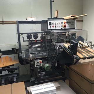 Theisen & Bonitz tb sprint 303 QS stitcher-folder-trimmer module, stitch heads and knife-fold, no rotary shaft — dealer photo (PressCity, OEM defunct)