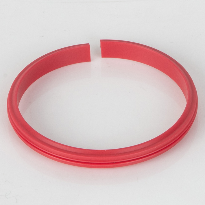 Red split creasing rib ring (female receiver ring) on white background