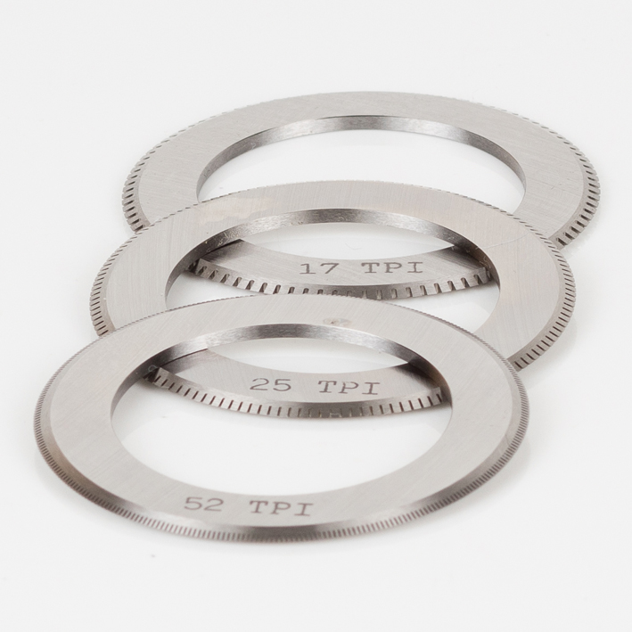 Three micro-perf blades stacked, engraved 17, 25 and 52 TPI