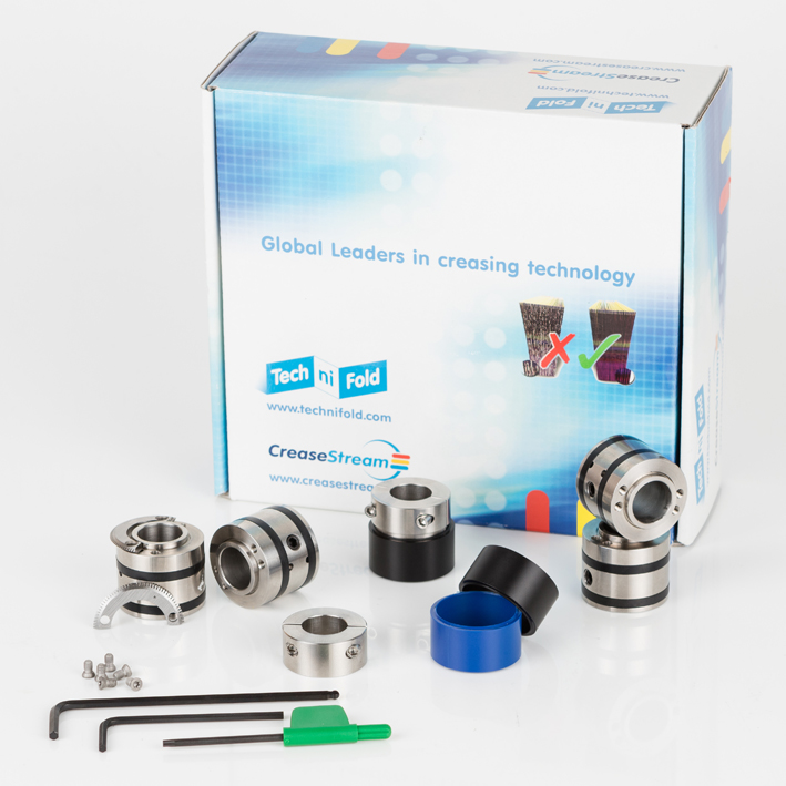Morgana micro-perf kit packshot: box, steel collars, sleeves, hex keys, fitting tools