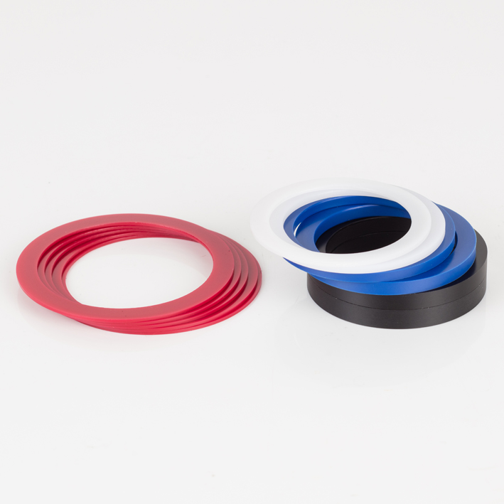 Group of red, white, blue and black spacer rings