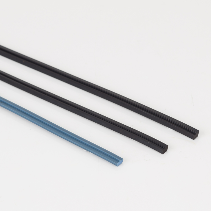 Three creasing matrix strips, two black one blue, on white