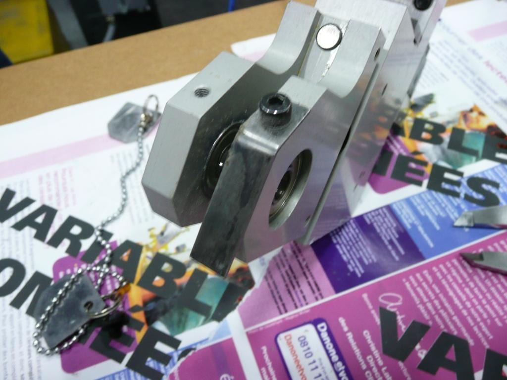 Machined holder assembly built for a specific machine