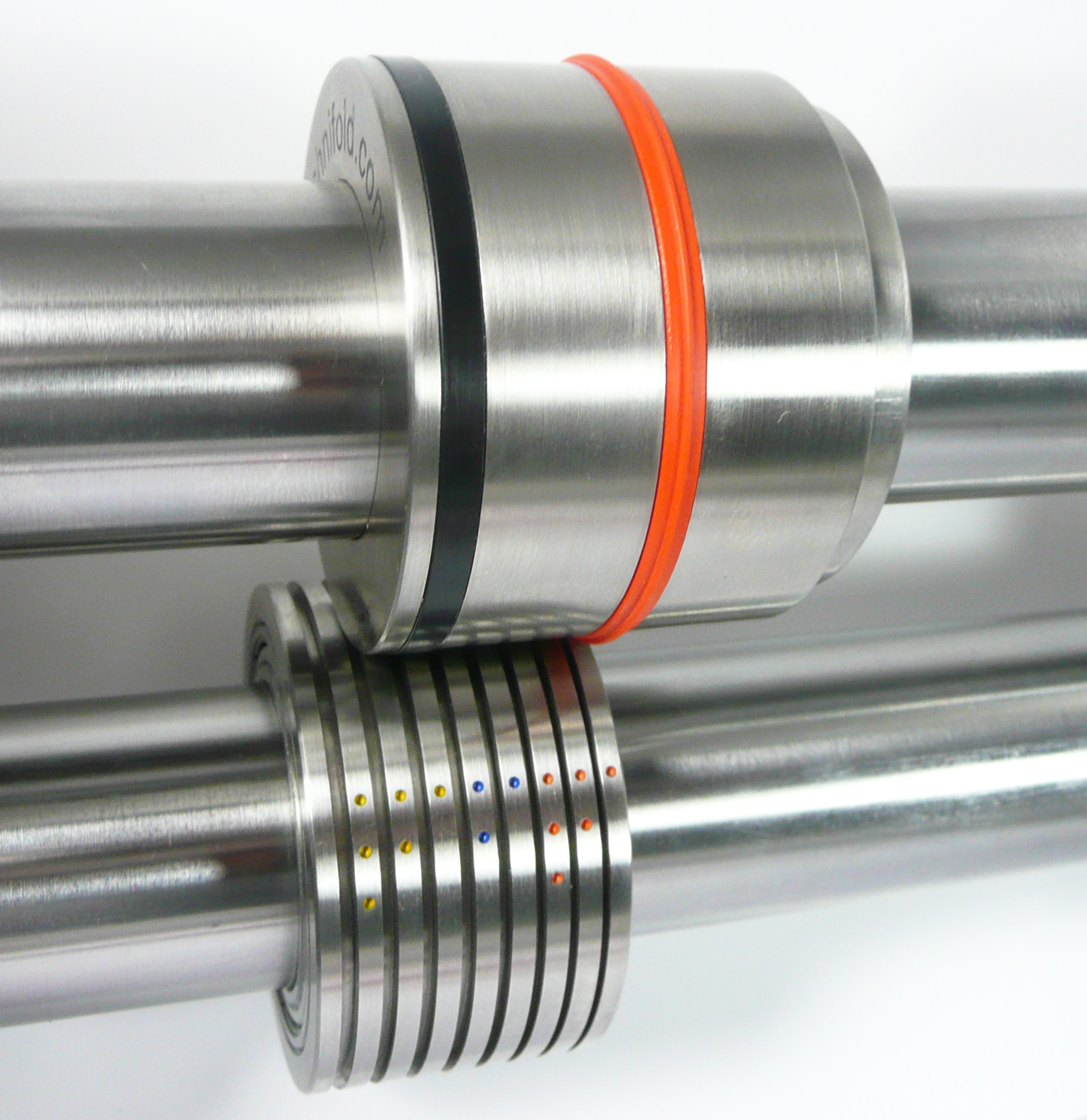 Technicrease creasing device on the cassette shafts, orange band above its colour-coded channel